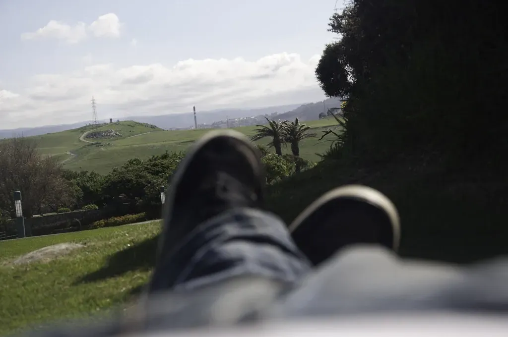 Person relaxing while mySites.guru handles the bulk installation