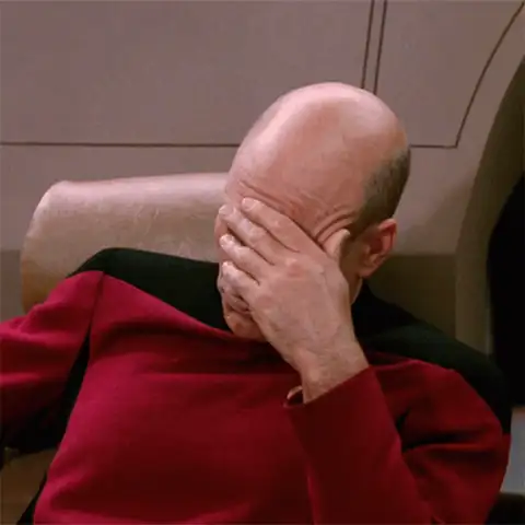 The animated Picard facepalm: Patrick Stewart as Captain Picard, in his red Star Trek uniform, slowly pressing his palm against his forehead